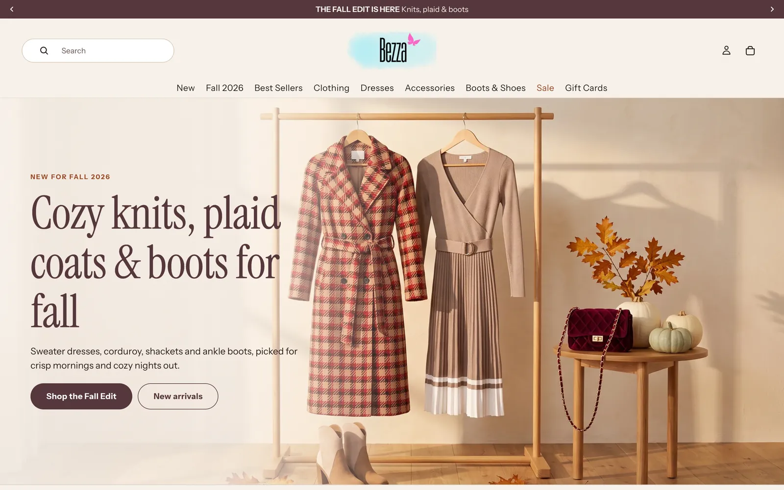 The Shop Bezza home page dressed for fall: a hero with knits, plaid coats and boots